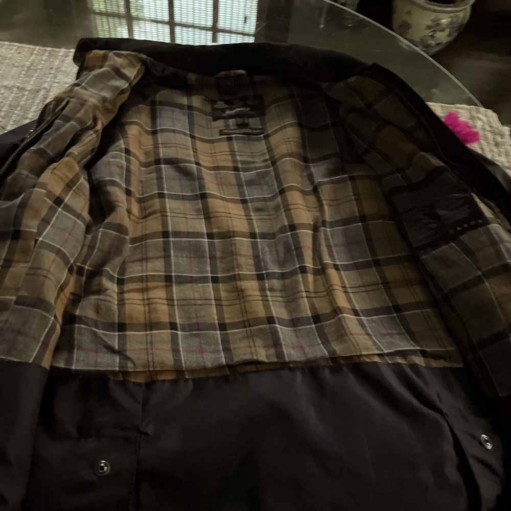Barbour Beadnell wax jacket.  Will include a new wax dressing with purchase.